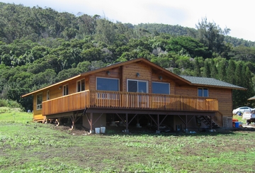 Custom remote home by Mauna Loa Cedar Homes
