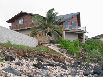 Custom remote home by Mauna Loa Cedar Homes