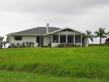 Custom remote home by Mauna Loa Cedar Homes